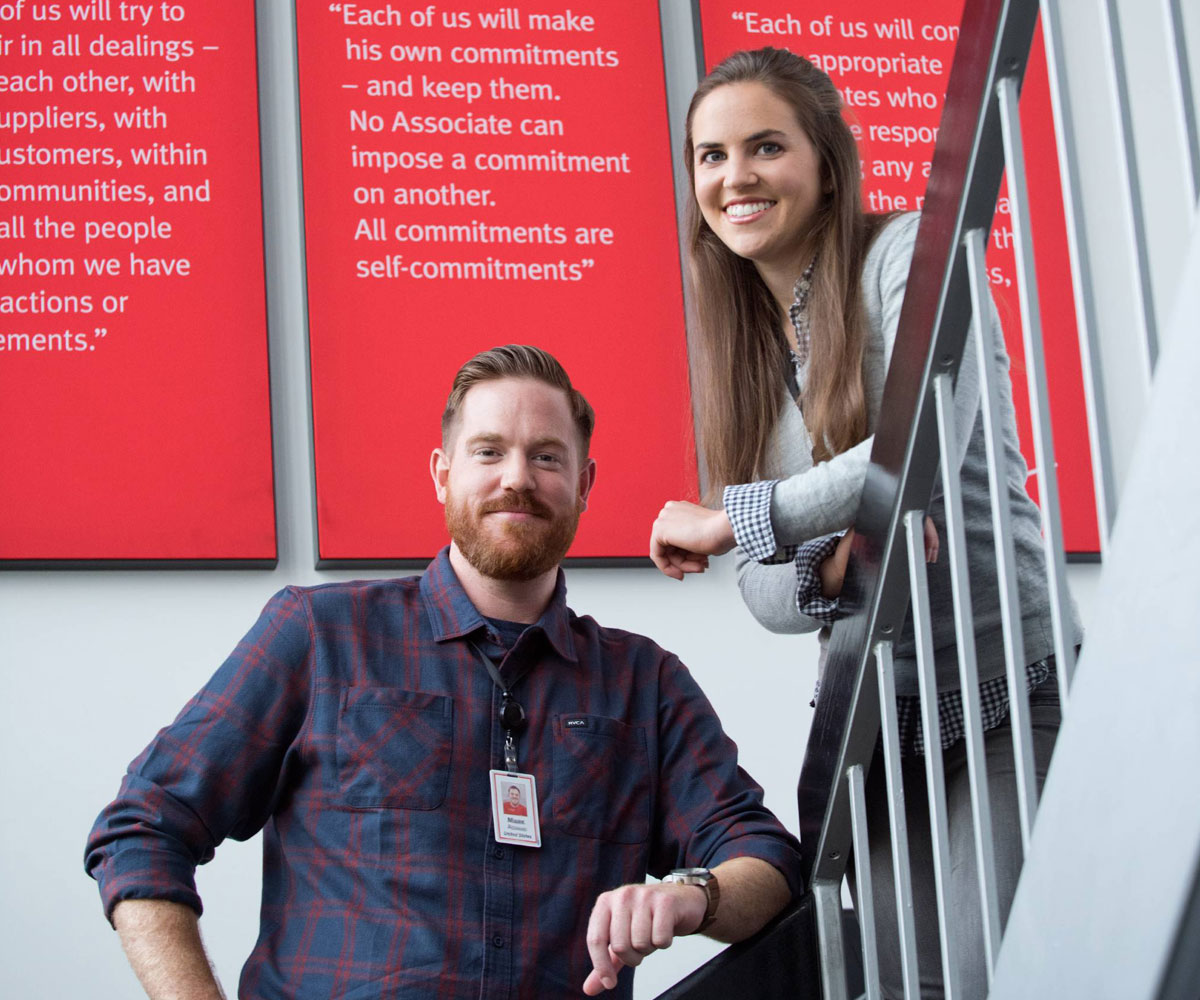 Two associates in a stairwell