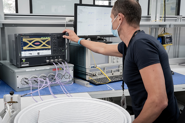 Gore testing lithography high-flex cables in signal integrity lab.